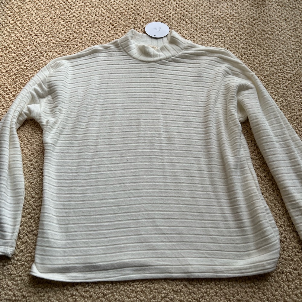 White high-neck sweater